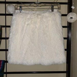 cream colored fake fur mini
